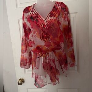 Beautiful swimsuit cover up or tunic.